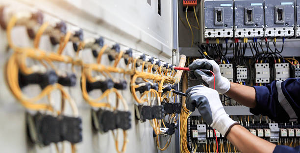 Professional Electrician technician working in Grain Valley, MO